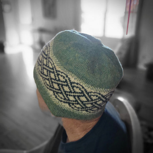 man wearing celtic knot beanie
